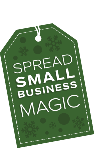 dark green tag saying "spread small business magic"