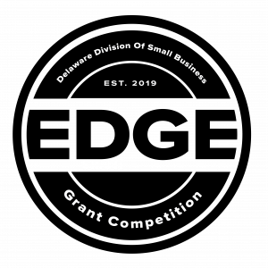 EDGE Logo in black. It's a circle with EDGE running through the middle. In a half-arc on top is the Division of Small Business. In a half arc on the bottom is Grant Competition. 